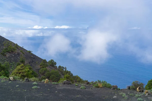 stock image View from the edge of the volcanic crater San Antonio to La Palma, Spain, to the valley and the Altantic Ocean