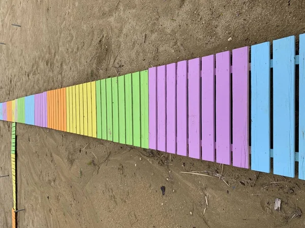 Colorful wooden pathway on the beach photo — Stock Photo, Image