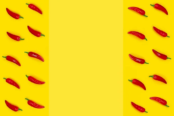 Red chili pepper frame on a yellow background with copy space. Ingredient of Mexican Cuisine. — Stock Photo, Image