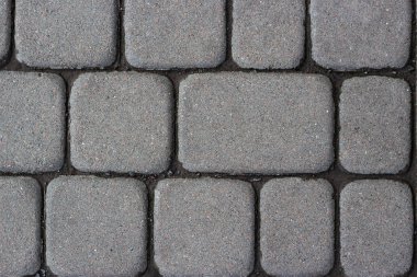 Zemin, duvar veya yol için beton veya arnavut kaldırım gri kaldırım levhalar veya taşlar Doku. Geleneksel çit, mahkeme, arka bahçe veya yol döşeme.