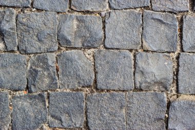 Eski şehirde parke taşı dokusu. Antik gri kaldırım