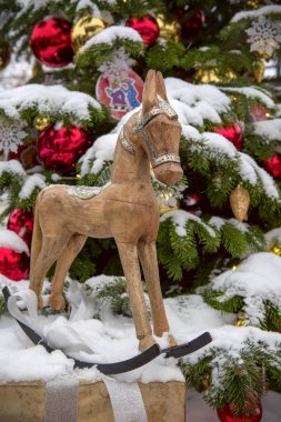 Christmas toys under the tree. Rocking horse