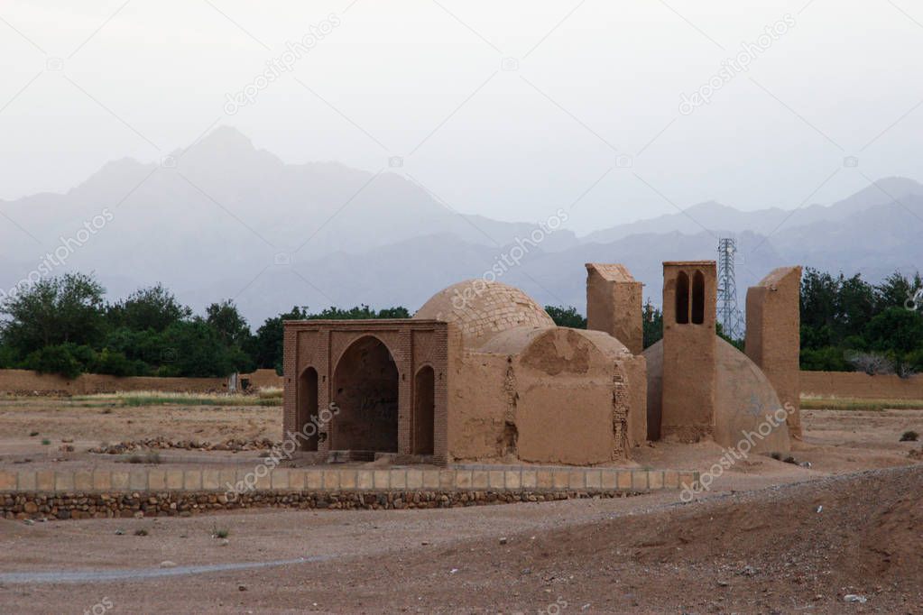 Ancient sandy house in the traditional style of Iran. Persia