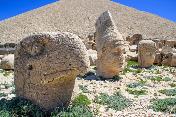 Ancient stone sculptures of kings and animals on Mount Nemrut (Nemrut Dag). monumental tomb made for Antiochus, Adiyaman, Turkey