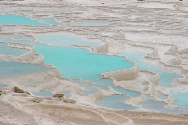 Famous and amazing thermal springs Pamukkale or Cotton Castle on Denizli Province in in Turkey. Gentle turquoise water in the bath
