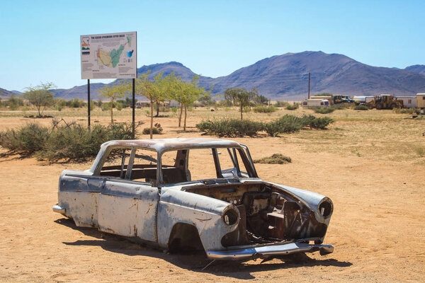 SOLITAIR, NAMIBIA - April 27, 2015: abandoned old rusty cars in the desert of Namibia near the Namib-Naukluft National Park. Africa