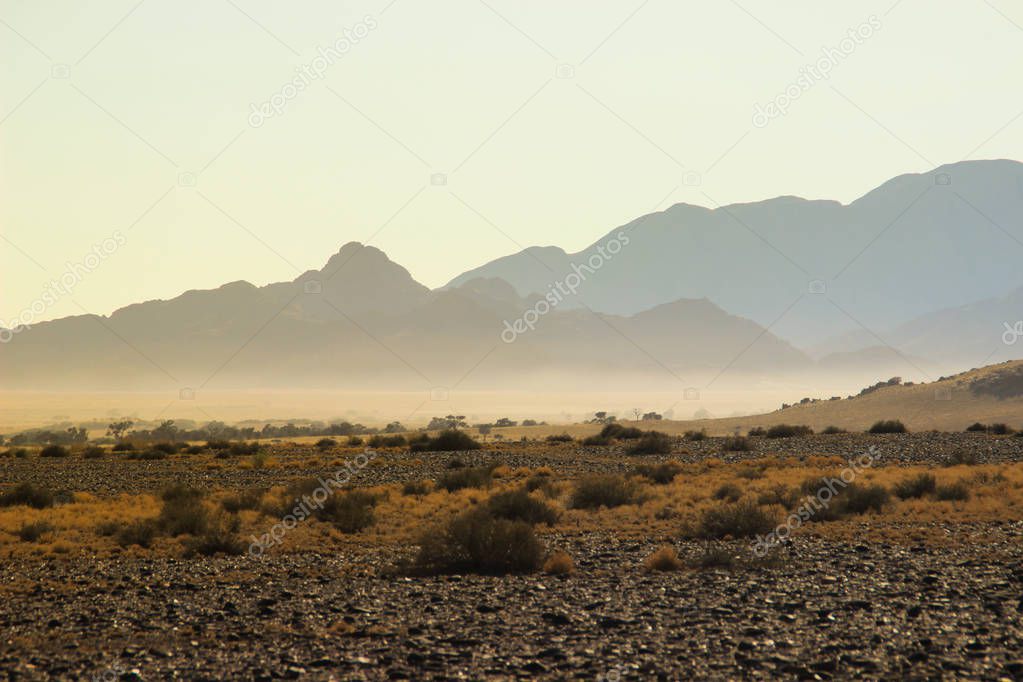 Desert landscapes with mountains in the south of Namibia. The dry season, dry vegetation is a natural background.