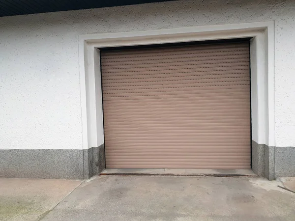 Garage with roller gate roller shutters