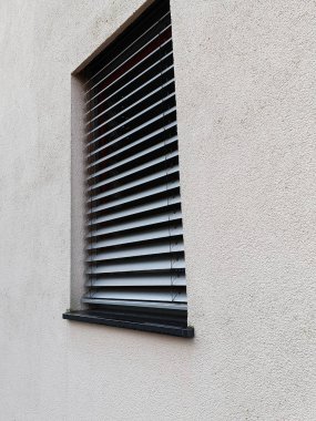 Blinds, roller shutters, window shop to protect at the window clipart