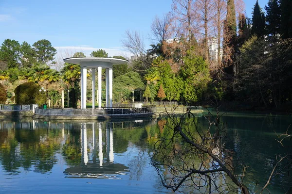 gazebo, pond and trees in the arboretum of the city of Sochi