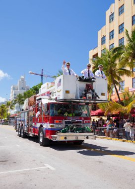 MIAMI, FLORIDA - APRIL 2016: people attending 8th Annual Miami Beach Gay Pride Parade clipart
