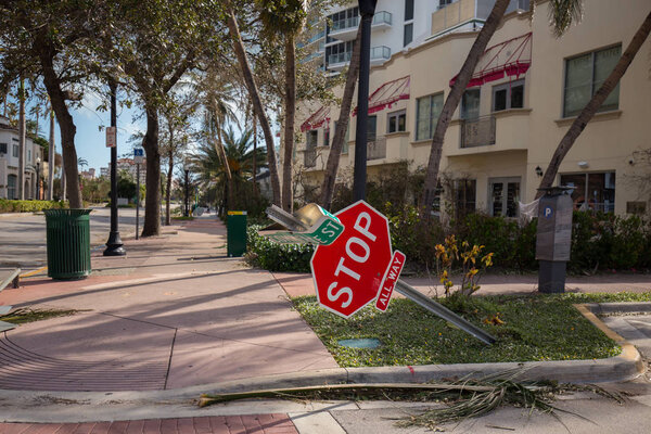 MIAMI BEACH, FLORIDA, USA - 11 SEPTEMBER 2017: fallen road signs Miami Beach after Hurricane Irma