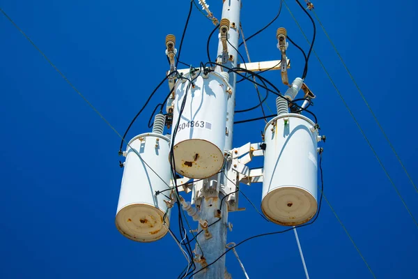 Electric pole with transformer and wires in USA