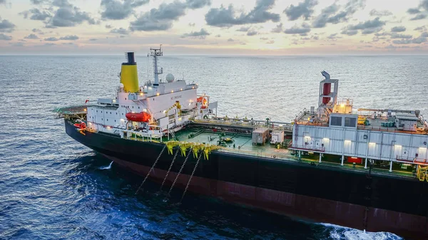 Floating Production and Storage Offshore ship view with beautiful cloudy sunset sky