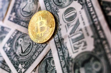 bir dolar fatura arka plan üzerinde sanal para altın bitcoin. Cryptocurrency, yeni dünya düzeni kavramı. Bir dolar için Exchange bitcoin nakit.