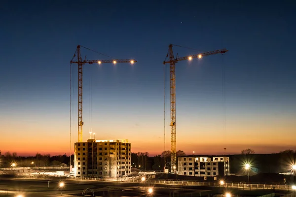 Tower Cranes Unfinished Multi Storey High Buildings Construction Site Sunset — Zdjęcie stockowe