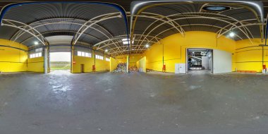 GRODNO, BELARUS - JULY 24, 2017: 360 panorama in interior stock storage of plastic bales at the waste processing recycling plant. Full 360 angle view seamless panorama in equirectangular projection. clipart