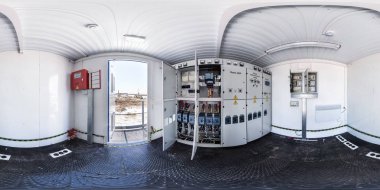 GOMEL, BELARUS - FEBRUARY, 2017: panorama 360 angle in interior high voltage power unit shield. Full spherical 360 degrees seamless panorama in equirectangular equidistant projection. VR AR content clipart