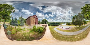 panorama 360 angle view near ancient stone wooden orthodox church on high bank of river. Full spherical 360 degrees seamless panorama in equirectangular projection, VR AR content clipart