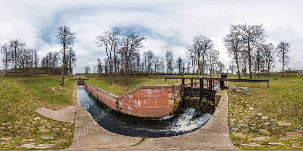 panorama 360 angle view near gateway lock sluice construction on river, canal for passing vessels at different water levels. Full spherical seamless 360 degrees  panorama in equirectangular projection