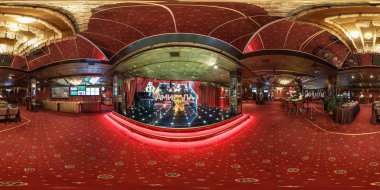 MINSK, BELARUS - FEBRUARY, 2017: full seamless panorama 360 degrees angle view in interior elite luxury casino with croupiers girls in red style in equirectangular spherical projection. VR content clipart