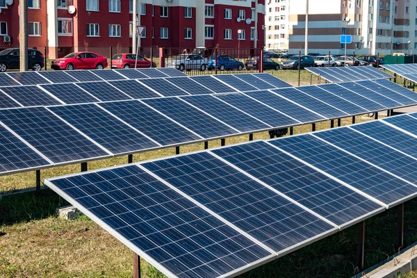 Solar panels near  residential quarter of the city. Renewable solar energy.