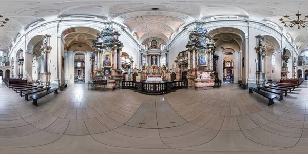 VILNIUS, LITHUANIA - MAY 2019: Full spherical seamless hdri panorama 360 degrees angle inside interior of old baroque catholic church of all saints in equirectangular projection, VR AR content — Stock Photo, Image