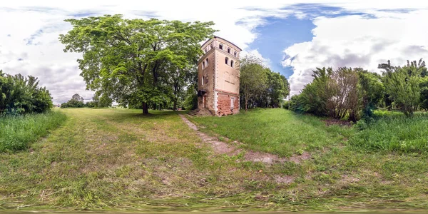 Full seamless spherical hdri panorama 360 degrees angle view on old stone abandoned fire tower in village park in equirectangular projection, ready for  VR AR virtual reality content — Stock Photo, Image