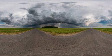 full seamless spherical hdr panorama 360 degrees angle view on asphalt road among fields in evening with awesome black clouds before storm in equirectangular projection, VR AR virtual reality content clipart