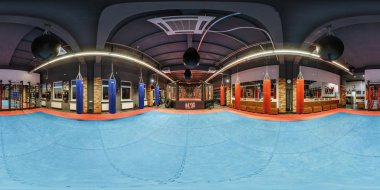 GRODNO, BELARUS - MAY 2019:  seamless spherical hdri panorama 360 degrees angle inside interior of martial arts with fighting ring and punching bags Fight club equirectangular projection, VR content clipart