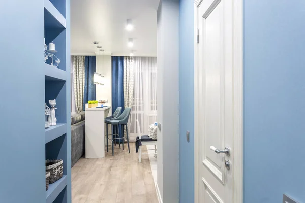 MINSK, BELARUS - SEPTEMBER, 2019: door in modern entrance hall of corridor in blue light color in expensive apartments — Stock Photo, Image