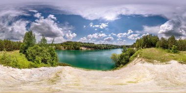 full seamless spherical hdri panorama 360 degrees angle view on limestone coast of huge green lake or river near forest in summer day with beautiful clouds in equirectangular projection, VR content clipart