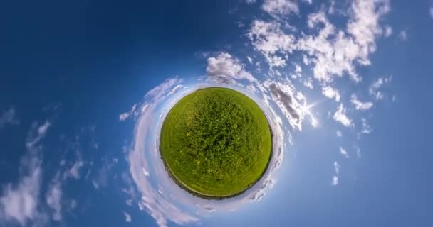 Green Little Planet Revolves Beautiful Evening Fluffy Clouds Little Planet — Stock Video