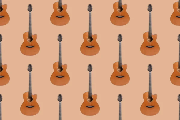 オレンジを基調とした6弦アコースティックギターの低いデッキの木の質感のシームレスなパターン — ストック写真