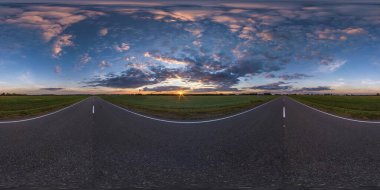 Full spherical hdri seamless panorama 360 degrees angle view on old no traffic asphalt road among fields in evening  before sunset with cloudy sky in equirectangular projection, VR AR content clipart