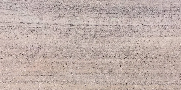 Vista Desde Arriba Superficie Carretera Grava Con Huellas Neumáticos Coche —  Fotos de Stock