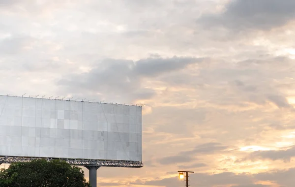 billboard blank for outdoor advertising poster or a blank billboard at a twilight time for advertisement