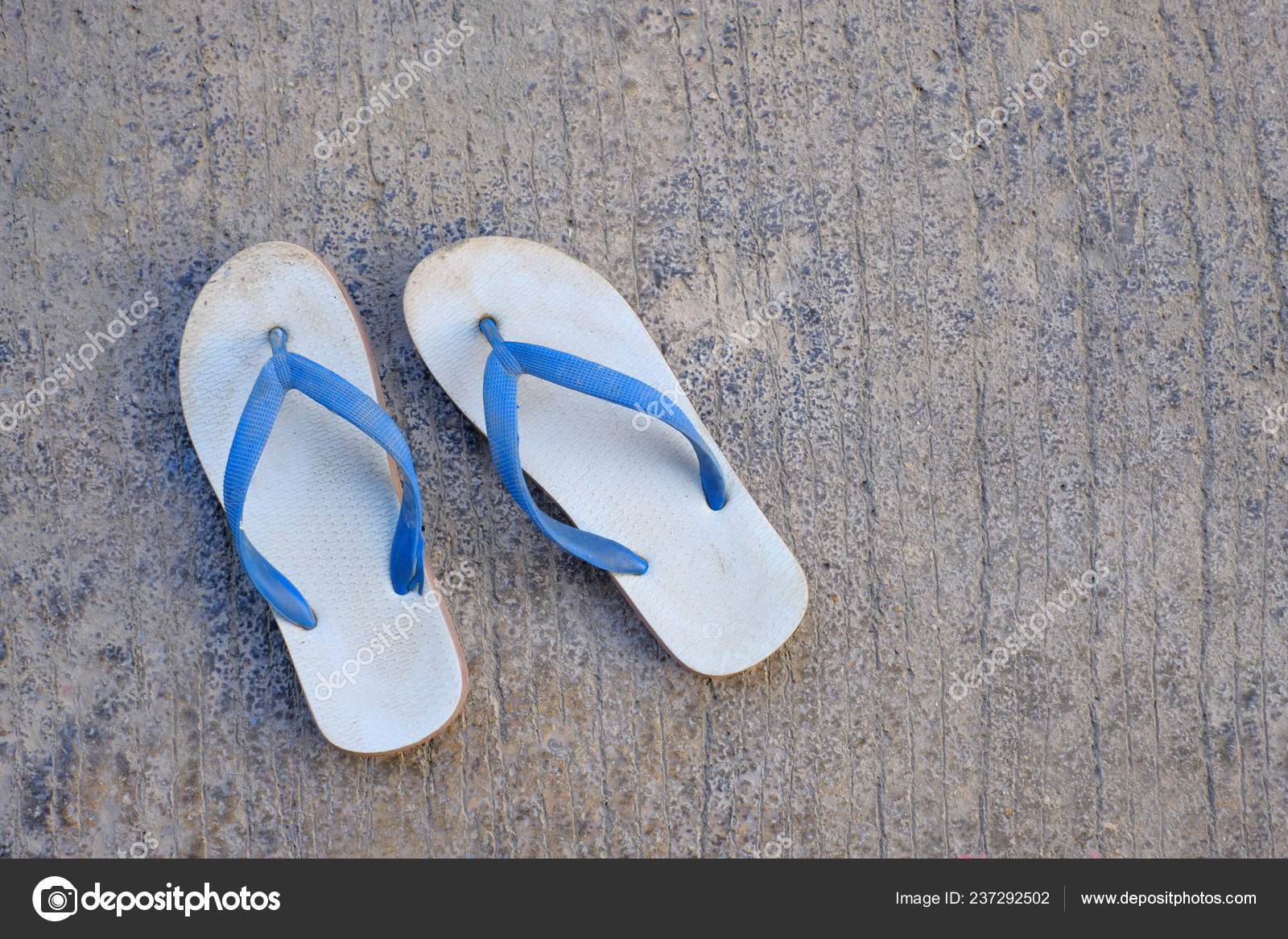 white and blue slippers