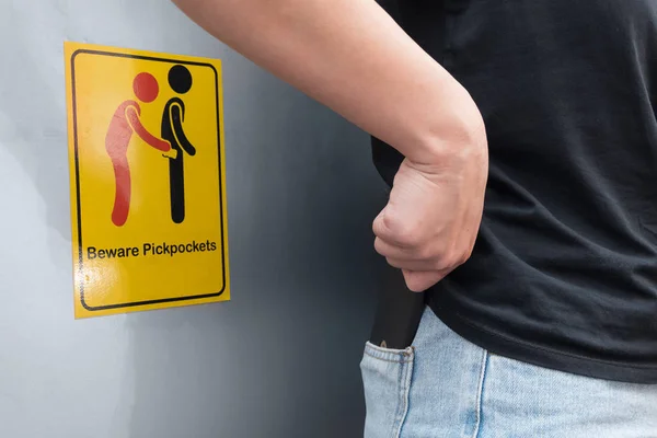 Women Careful Pickpocket Because She See Beware Pickpockets Sign Symbol — Stock Photo, Image