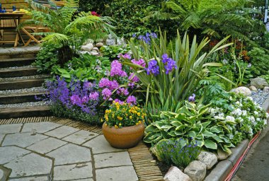 Patio Garden with planted containers on a terrace clipart