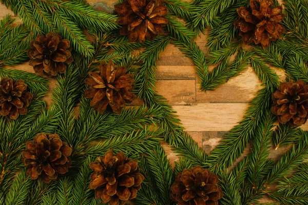 Fondo Navidad Ramas Abeto Conos Una Superficie Madera Con Espacio — Foto de Stock