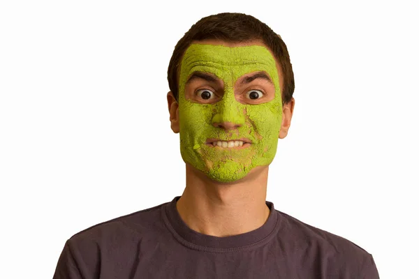 Portrait Young Guy Green Face Mask Making Faces White Background — Stock Photo, Image