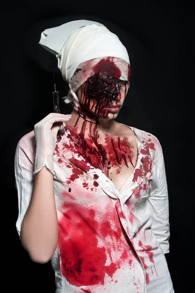 Nurse zombie. Halloween make-up.