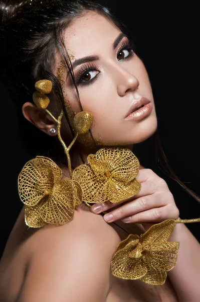 Gold Makeup. Fashion Girl Portrait