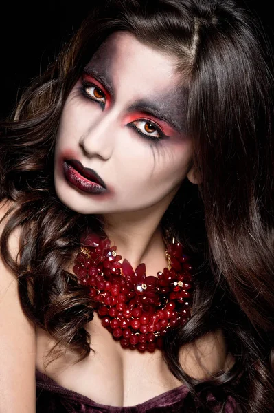 Portrait of a pale gothic vampire woman. Halloween Makeup