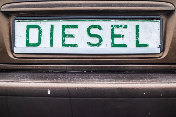 diesel emission fake registration plate, environmental slogan