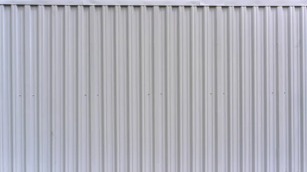 Striped local building wall of grey colour in city centre — Stock Photo, Image