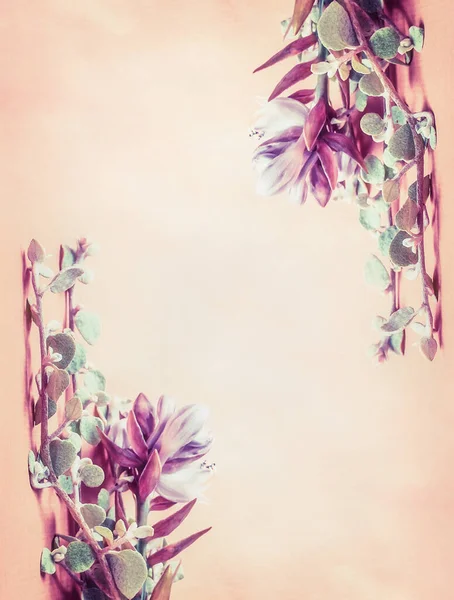 Floral frame with beautiful flowers on beige background, top view