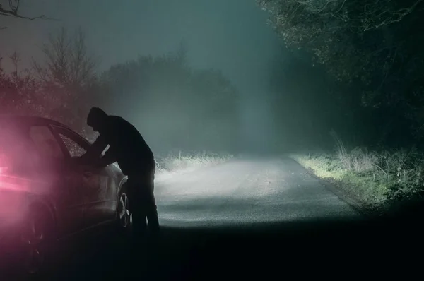 Lone Hooded Figure Looking Car Silhouetted Spooky Country Foggy Winters — Stock Photo, Image