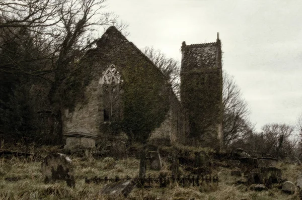 The ruined church of St Marys in Tintern on a cold spooky winters day. Monmouthshire, Wales, UK. With a grunge sepia edit.